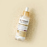 Dr.Melaxin Peel Shot PS Exfoliant Rice Ampoule - flacon posé sur du riz